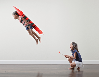 Illustration for article titled Insane and magical photos a father created of his daughters